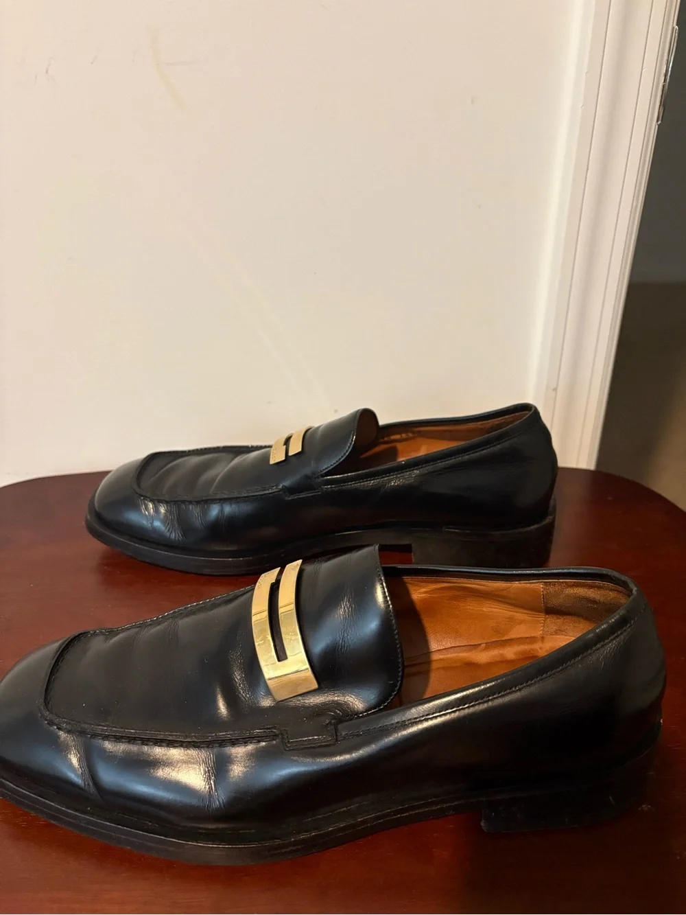Gucci Black Leather Slip-On Loafers with Gold Plaque